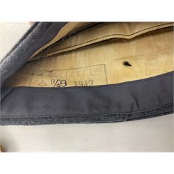 WW2 RAF sidecap dated 1942 with badge and buttons; quantity of RAF metal and cloth badges, pips and buttons; and paratrooper's helmet chin strap