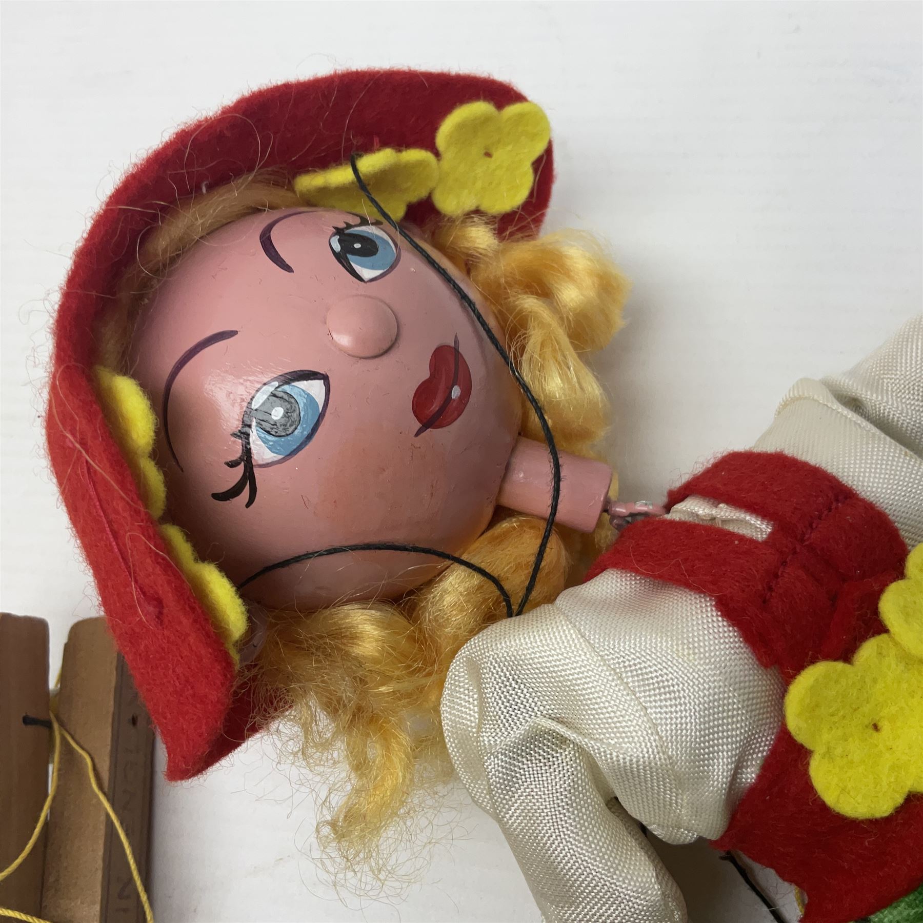 Pelham Puppet - Tyrolean Girl in yellow box; three 'A' Team action figures; clockwork plastic Mickey Mouse figure; and seven various fashion dolls (12)