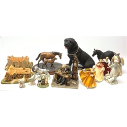 Two Royal Doulton figures; Kirsty and Autumn, Heredities Creamware Horse group, large model of a Black Labrador, two Milestones house models 'Tuthill Manor' and 'Washington', Sylvac Toothache Dog no. 2455, Capodimonte and other figures 