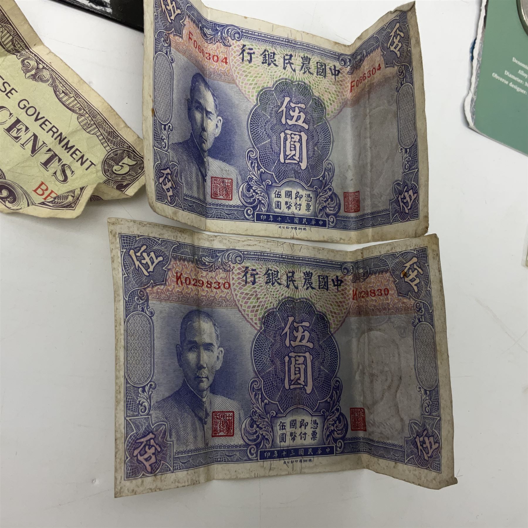 King George V 1935 crown coin, King George VI 1951 Festival of Britain crown in maroon box, various pre decimal coins, Ireland 1928 florin, Queen Elizabeth II UK 2007 five pound coin, two 'The Farmers Bank of China' five yuan notes etc