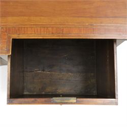 Regency period inlaid mahogany bow-breakfront sideboard, shaped rectangular top with crossbanding and ebony stringing, central convex frieze drawer flanked by cupboard and cellarette drawer, over fan-inlaid spandrels, raised on square tapering supports