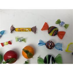 20th century glass fruit, including bananas, peppers, satsumas, etc together with a large collection Murano style glass sweets, of various size and design
