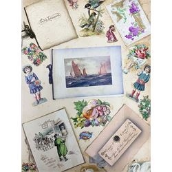 Victorian scrapbook of various fixed decoupage to include, greeting cards, portraiture, flowers, animals etc,