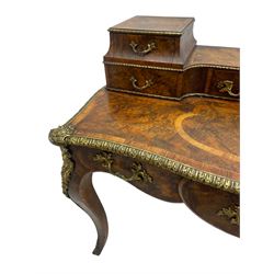 Late 19th to early 20th century French figured walnut writing desk, raised back fitted with drawers, shaped top with Kingwood banding and foliage cast edge moulding, fitted with single drawer, on cabriole supports mounted by shell and flower head cartouches 