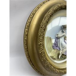 Set of four early 20th century Continental bisque plaques, each of circular form, modelled in high relief as the Four Seasons personified, within gilded circular frames under convex glass, overall D44.5cm