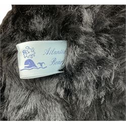 1991 Atlantic Bears limited edition black teddy bear, the revolving head with applied eyes, vertically stitched nose and jointed limbs with growler mechanism No.84/100 H53cm; together with clockwork tin-plate road roller possibly by Mettoy and a push-along painted scratch built wooden locomotive (3)