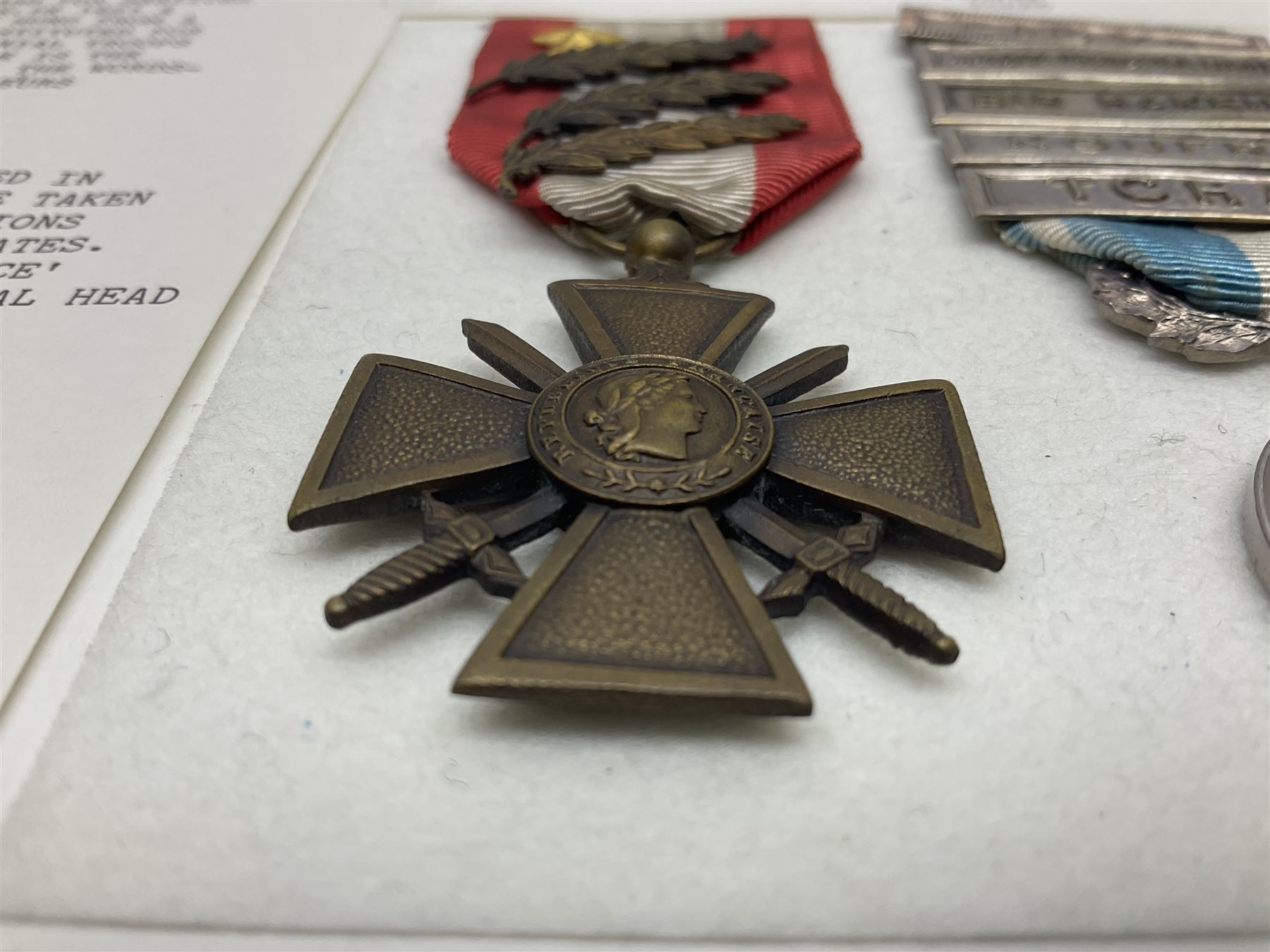 French Republic Colonial Medal with five clasps for Libye, Afrique Francaise Libre, Bir Hakeim, Koufra and Tchad; and Croix de Guerre Des Theatres D'Operations Exterieurs with three MID leaves and gold star; both with ribbons (2)