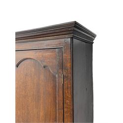 George III oak livery cupboard, projecting moulded cornice over two panelled doors, the upper panels within stepped ogee and arched moulded frame, the interior fitted with a single row of wooden hooks, two short and one long drawers, on bracket and return skirted base 