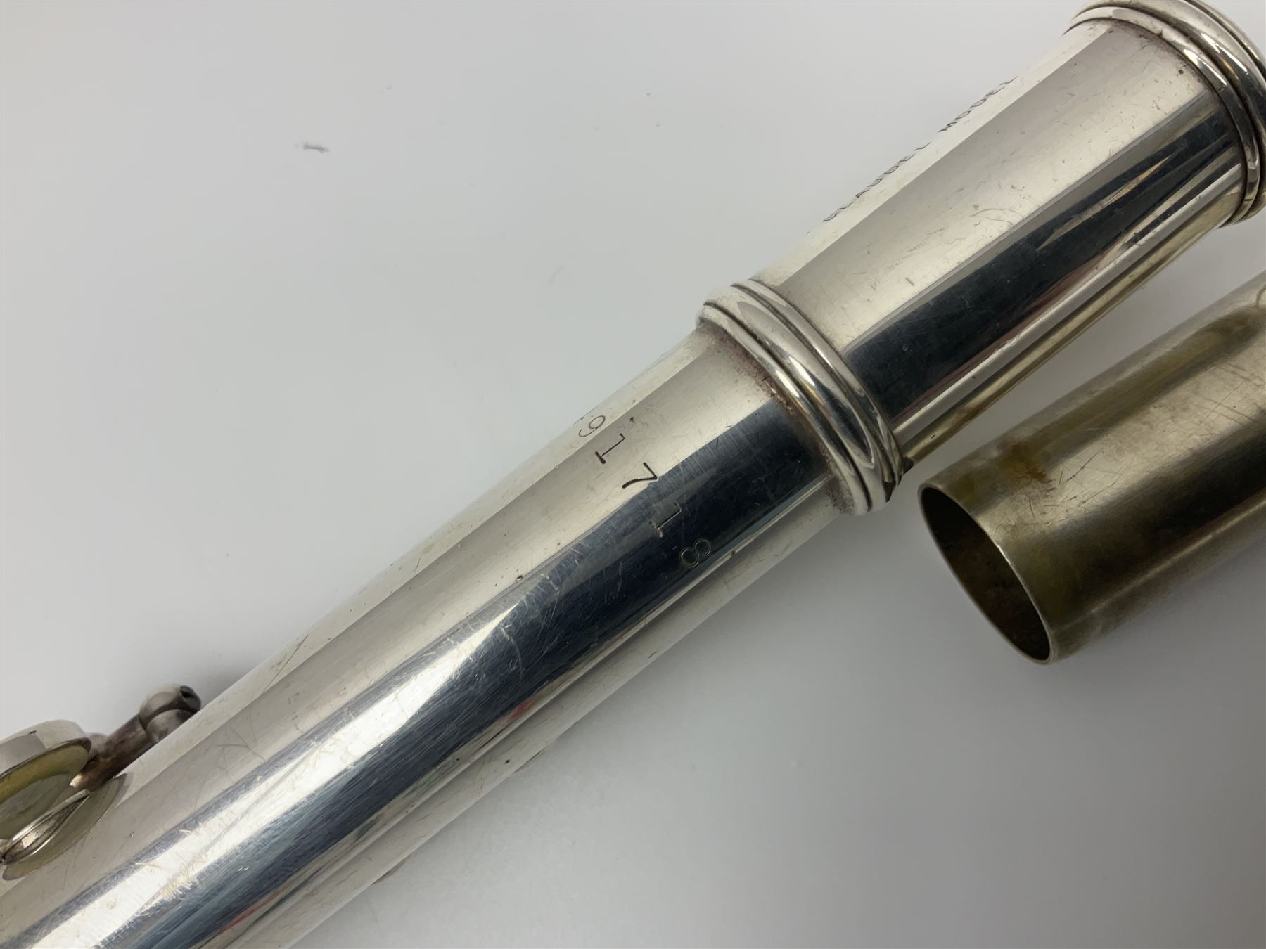 Boosey & Hawkes London Regent three-piece flute, serial no.345447; in B&H Bandhite hard carrying case; and Deg Music Company Inc. USA Claudel Model three-piece flute, serial no.491718, in hard carrying case (2)