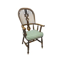 Late 19th century Yorkshire Windsor armchair, high stick back with pierced and fretwork splat, turned supports joined by H-stretcher