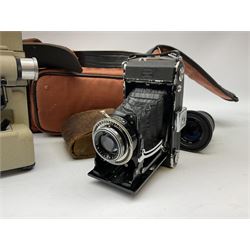 A cased Pentax ME Super camera, together with additional Pentax lens, further lens and other accessories, plus a Zeiss Ikon folding camera, and an Eumig 8mm projector with film. 