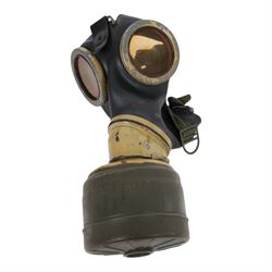 WWII German armed forces gas mask, housed in the original issue tin, tin H27cm