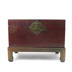 Chinese red lacquered chest on hardwood stand, with twin carrying handles, including stand H37cm x W49cm
