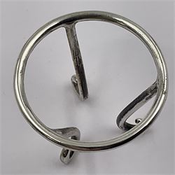 Modern silver limited edition Easter egg, no. 70/500, the openwork lattice body decorated with gilded panels of flower heads, opening to reveal a gilt interior, upon silver stand with three scrolling pad feet, each hallmarked St James House Company, London 1979, height including stand 8cm