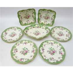  Booths Silicon China dessert service, floral decorated with green scale border, retailed by T. Goode & Co. London (7)  