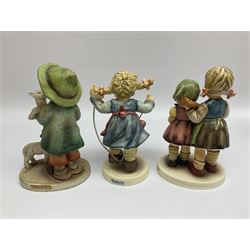 Twenty five Hummel figures by Goebel, to include Tuning up, Blessed Event, Book Worm, The Little Architect etc 