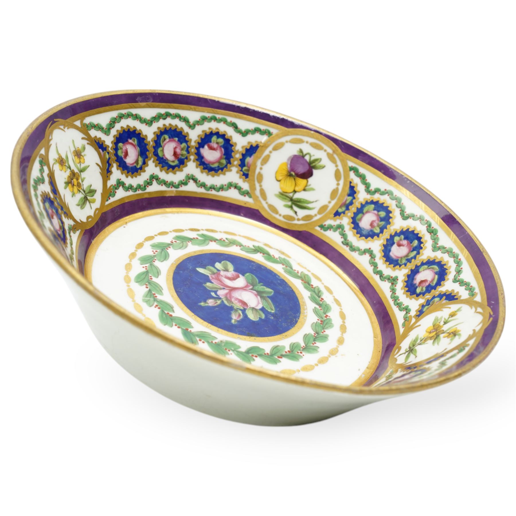 19th century Sevres type floral painted bowl with panels of flowers interspersed with small panels of pink rosebuds surrounded by trailing leaves D20cm with Sevres mark to base