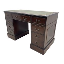 Georgian style mahogany twin pedestal desk, fitted with nine drawers