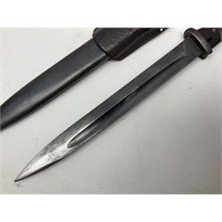 WWII German K98 Mauser bayonet by E. & F. Horster, the 24.5cm fullered blade marked 43aSW for 1943, numerous inspection marks to blade and pommel, bakelite grips and bluing to metal parts; in steel scabbard with corresponding numbers and leather frog L42cm overall