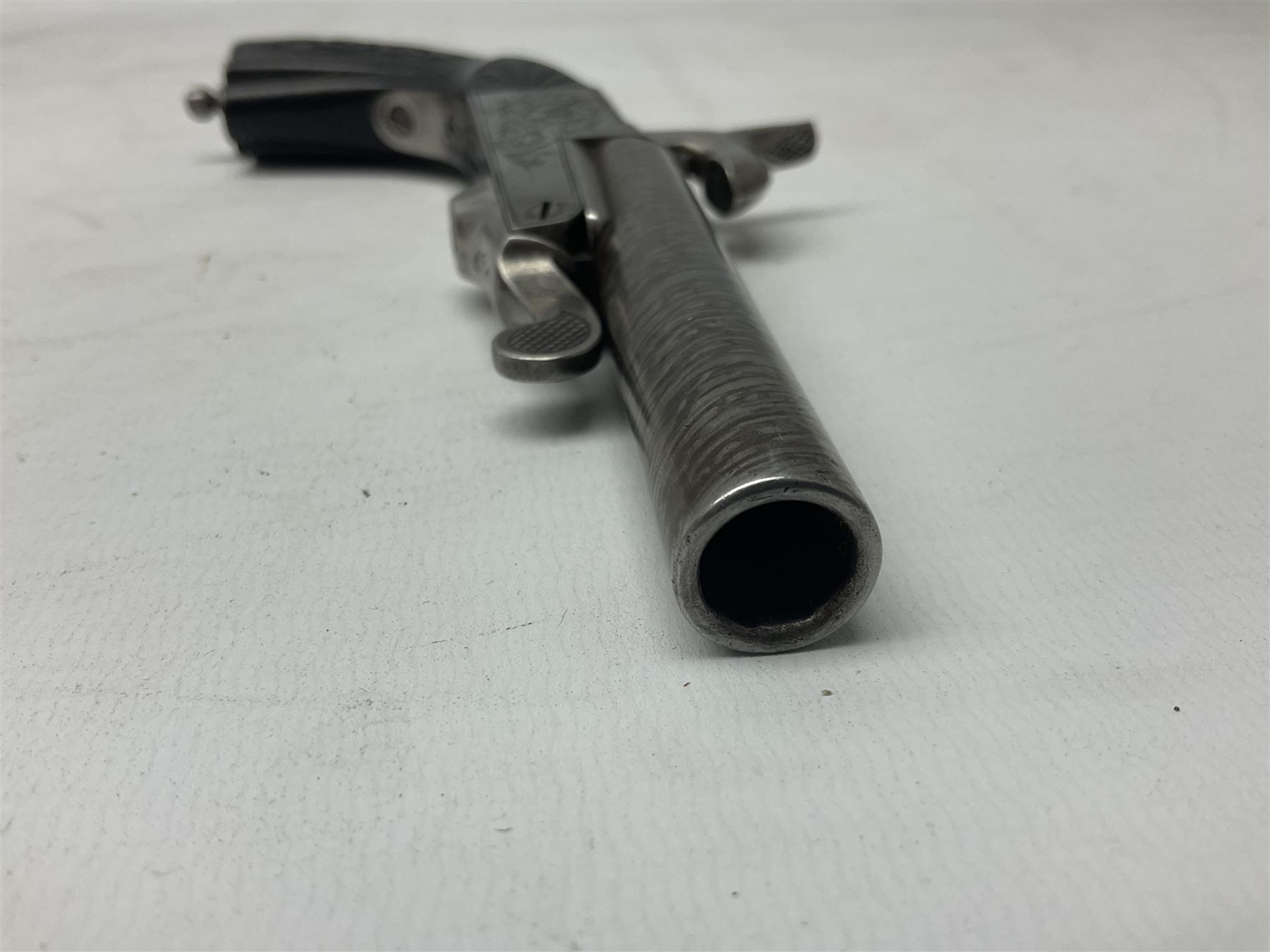 Mid-19th century French Boissy 12mm single barrel pin-fire pistol, the 9.5cm rifled barrel with brown stub twist damascus decoration, side screw under lever opening and English proof marks, retailed by H. Akrill Beverley, chased action with drop-down trigger and carved walnut stock L21cm