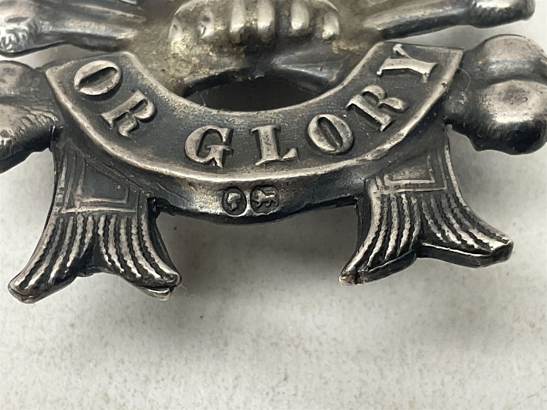 17th DCO Lancers Victorian NCO silver pre-1890 arm badge; early die-stamped skull and crossed bones stamped with Victoria head and lion; two loops verso