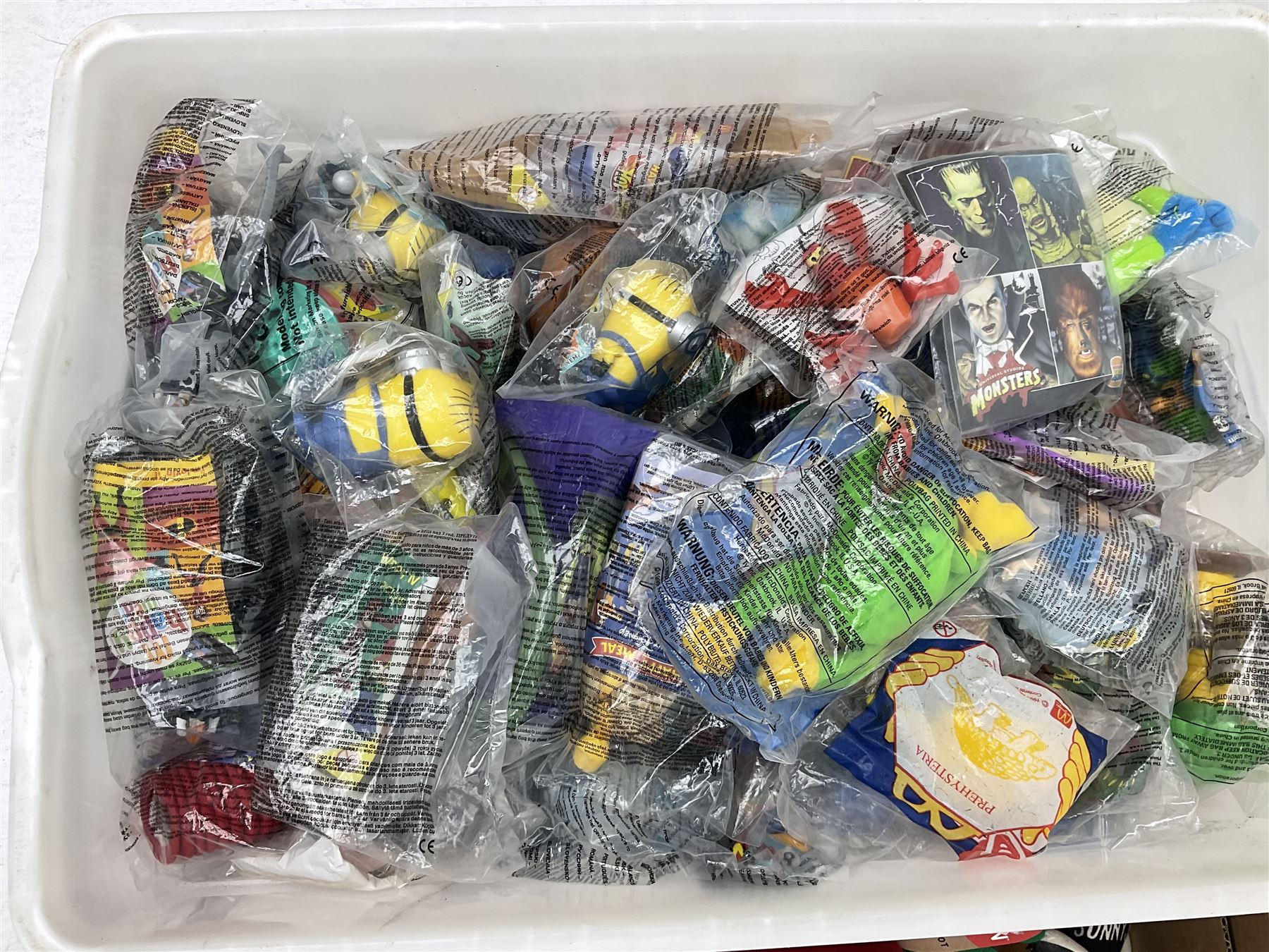 Quantity of Sunny Jim advertising soft toys, together with a quantity of Mcdonalds toys in two boxes