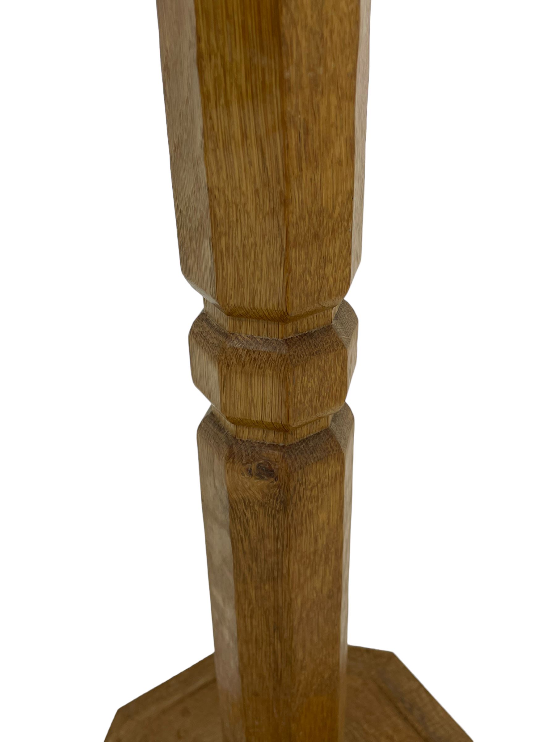 Mouseman - oak standard lamp, octagonal tapered column on octagonal base carved with mouse signature, by the workshop of Robert Thompson, Kilburn