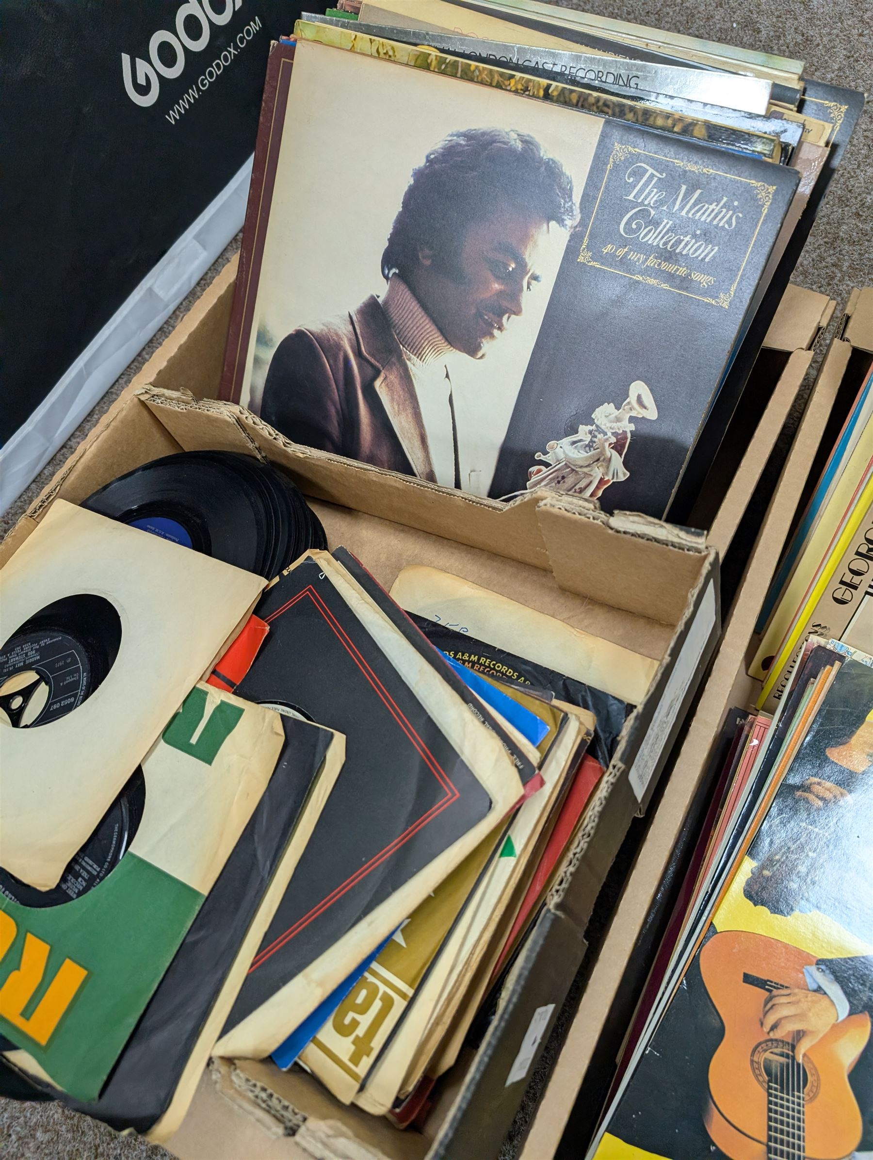 Collection of vinyl records, including Johnny Mathis, George Formby, Arthur Rosebery, Herb Alpert, etc in three boxes