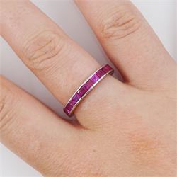 Platinum channel set, calibre cut ruby full eternity ring  