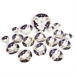John Ridgway teaset decorated with floral sprays, dark blue and gilt comprising ten tea cu...