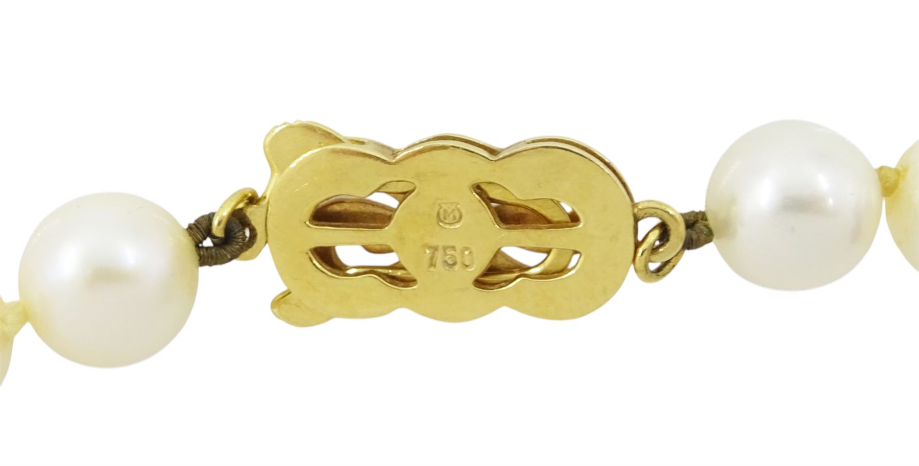 Mikimoto single strand cultured white pearl necklace, with 18ct gold clasp, stamped 750, boxed with certificate dated 1983