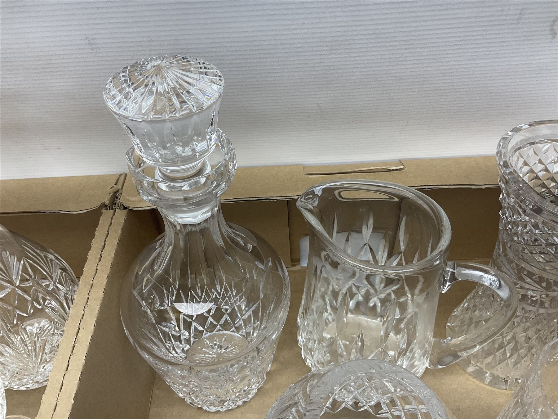 Collection of Waterford and Tyrone crystal, including wine glasses, clock, bowl, etc, together with a collection of other cut glass and crystal