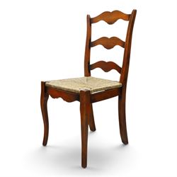 French cherry wood extending dining table, rectangular top on square chamfered supports with two additional leaves; with Batheaston - set of eight cherry wood waived ladder back dining chairs with rush seats (W46cm H98cm)
