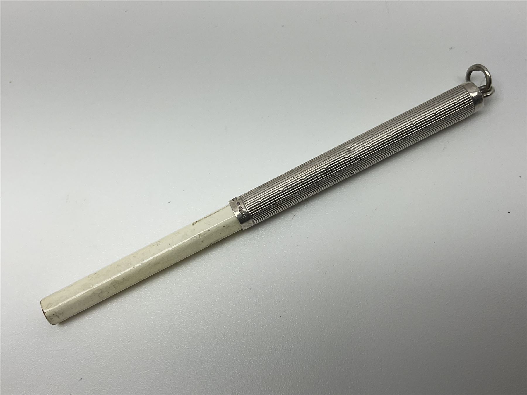 Victorian style silver chatelaine necklace, suspending eight silver sewing and similar accessories, including tape measure, needle case, pencil holder, powder compact and pill box