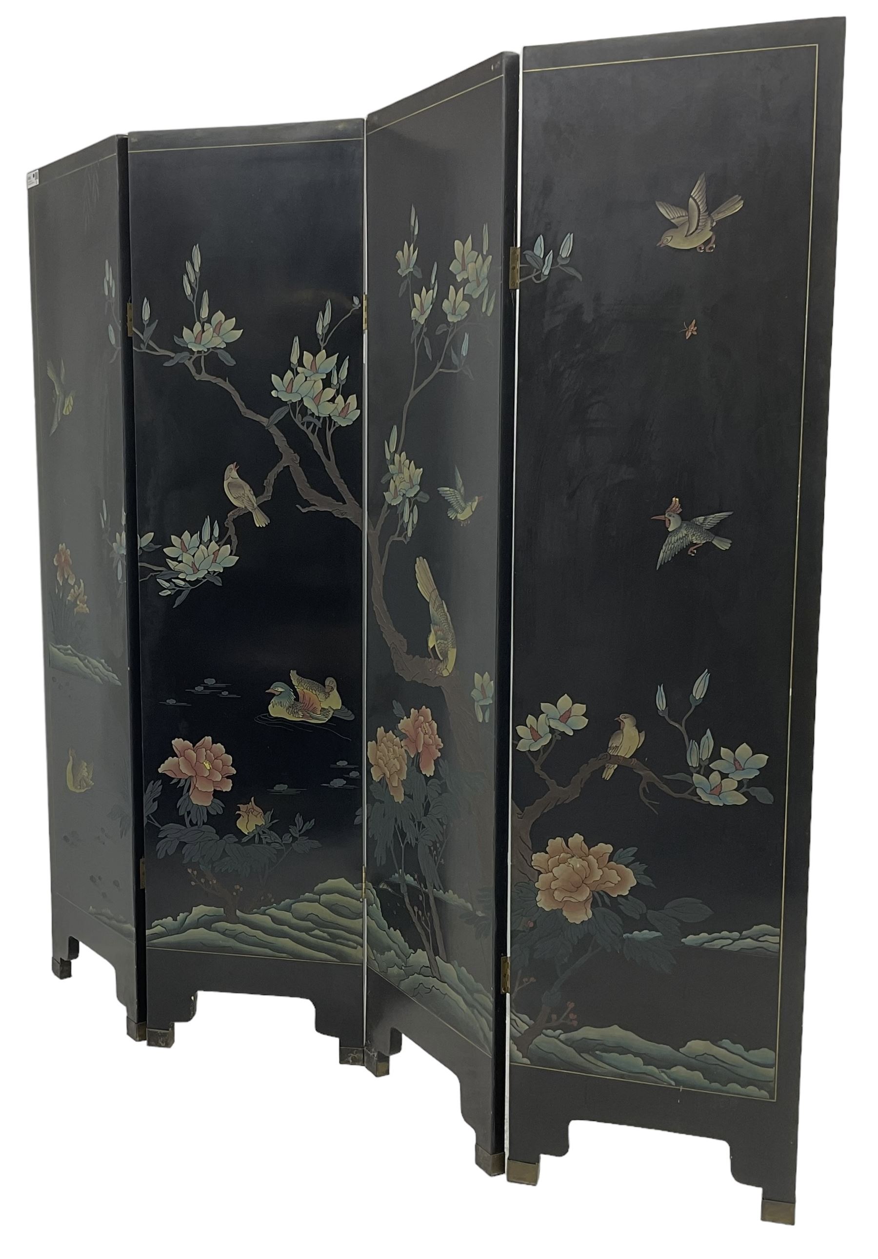 Chinese four-panel folding room screen, black lacquered with a naturalistic scene decorated with trees, birds and flowers