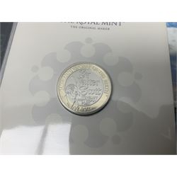 Commemorative coins including 2018 '40 Years of The Snowman' brilliant uncirculated fifty pence coin, 2018 'Peter Rabbit' brilliant uncirculated fifty pence coin, 2021 'Celebrating the Life and Work of H.G. Wells' brilliant uncirculated two pound coin, 2021 'The 95th Birthday of Her Majesty The Queen' brilliant uncirculated five pound coin, etc., all housed in card folders