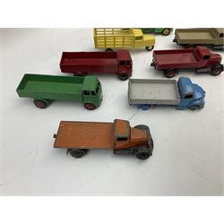 Dinky - eleven unboxed and playworn/repainted early die-cast commercial vehicles including flatbed and planked flatbed lorries, market garden lorry, tipper trucks etc (11)