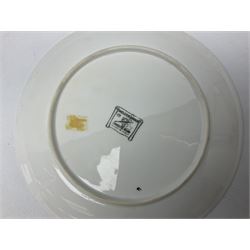 Three Fornasetti plates from the Melodramma series, each depicting a operatic portraits within a border of operatic emblems on gilt ground, with printed mark beneath, D25cm 