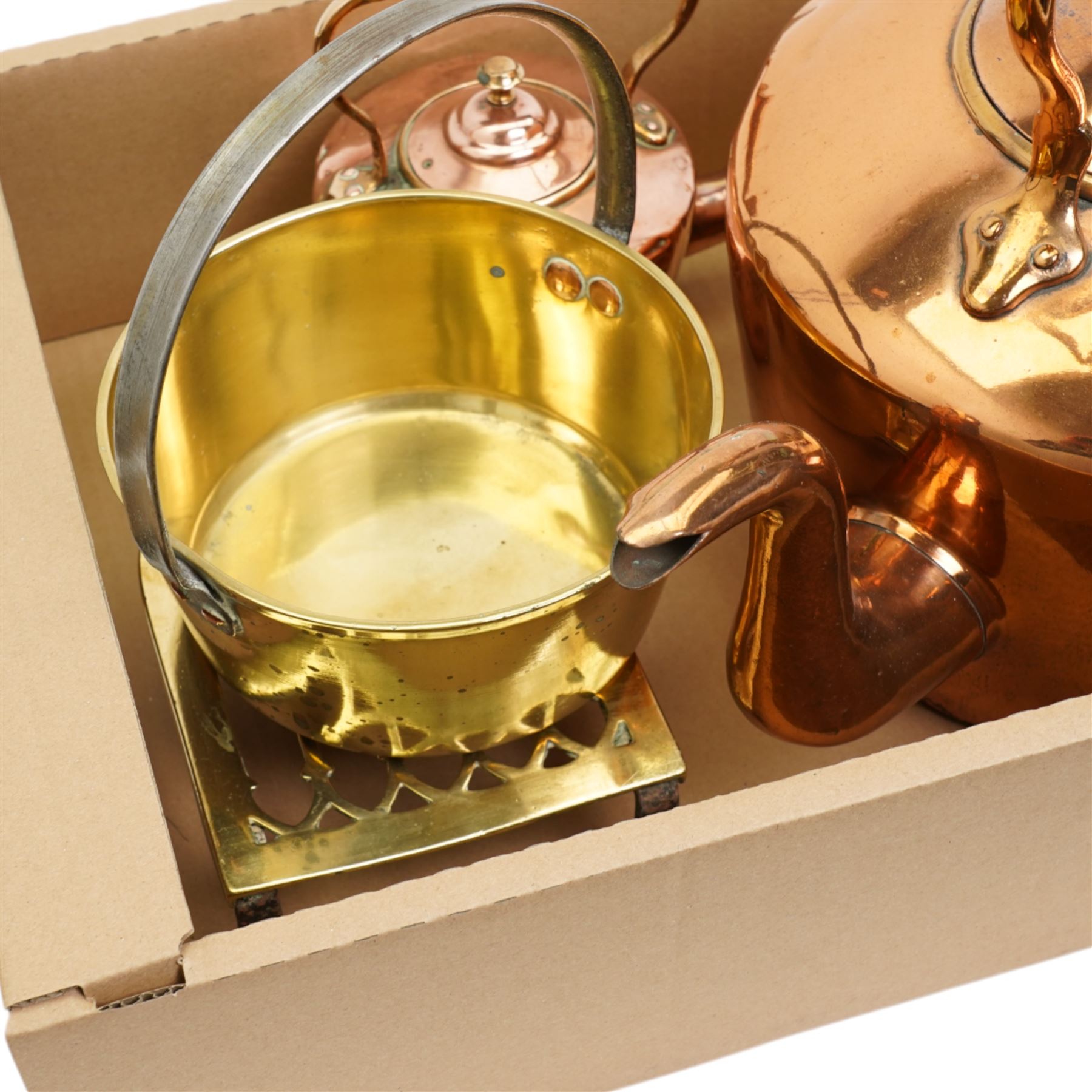 Large Victorian copper kettle, smaller kettle, brass trivet and a small brass preserve pan