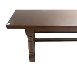 Large oak refectory design table, rectangular top on turned supports united by moulded H-shaped stretchers