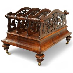  Victorian, walnut Canterbury- magazine rack with four fretwork upstands, drawer to base, standing on turned legs terminating in original castors. circa 1880