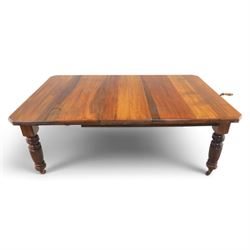 Victorian mahogany extending dining table and four chairs, rectangular top with moulded edge, extended to 198cm with additional leaf and winder, fluted and turned supports raised on castors, the chairs with swept frame and overstuffed seat, raised on cabriole front supports