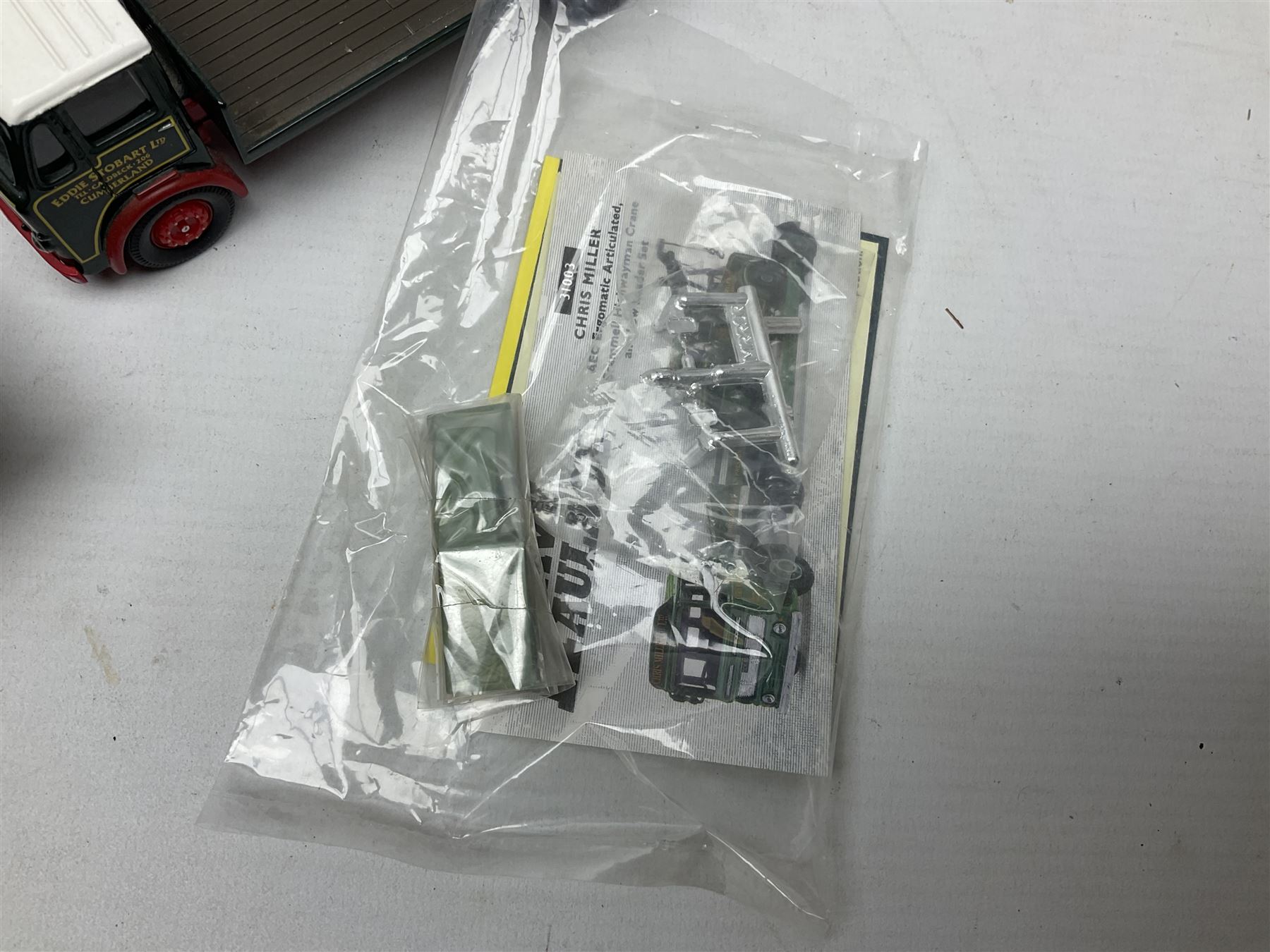 Corgi - two perspex cased 'Modern Trucks; 75202 ERF Curtainside Boddingtons and 75402 Leyland-DAF Curtainside Tate & Lyle; and nine unboxed Corgi lorries (11)