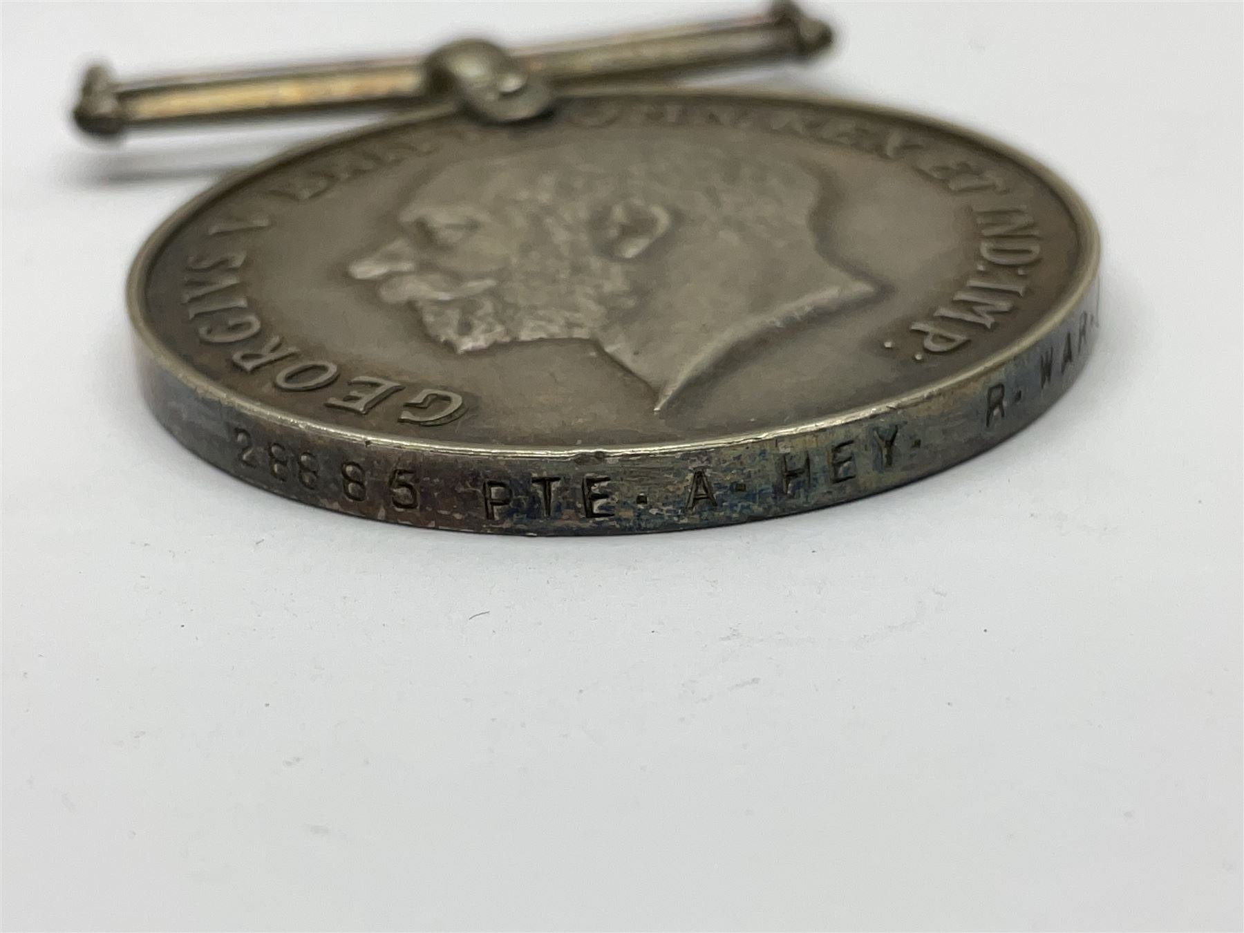 WW1 British War Medal awarded to 28885 Pte. A. Hey R. War. R.; WWI Victory Medal awarded to 7633 Pte. E. Edwards L'Pool R.; two WWII medals; Royal Navy Temperance Society Medal; Services Rendered badge No.B55177; and Home Guard lapel badge