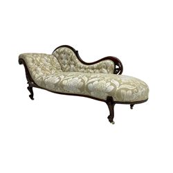 Victorian mahogany chaise longue, scrolled back with pierced and floral carved decoration, champagne foliate pattern fabric, cabriole feet with brass and ceramic castors