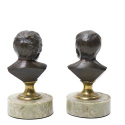 After Jean Antoine Houdon (French 1741-1828): 'Jean qui pleure' and 'Jean qui rit', laughing and crying busts of a boy on circular marble base, H11cm