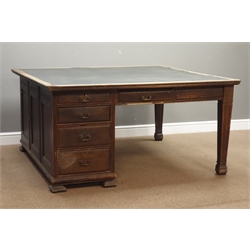  Large early 20th century library writing desk, single pedestal fitted with eight drawers and front cupboard, four frieze drawers, on moulded square tapering supports fitted with 'C&T Ltd. London' locks, labelled 'Designed & Made by Garnett & Sons Warrington', 153cm x 144cm, H77cm  