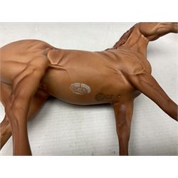 Collection of Beswick horse figures, to include Red Rum on a wooden plinth,  Lammtarra on oval plinth, Morgan Horse Black and three others, together with Royal Daulton Appaloosa Foal and a USSR horse
