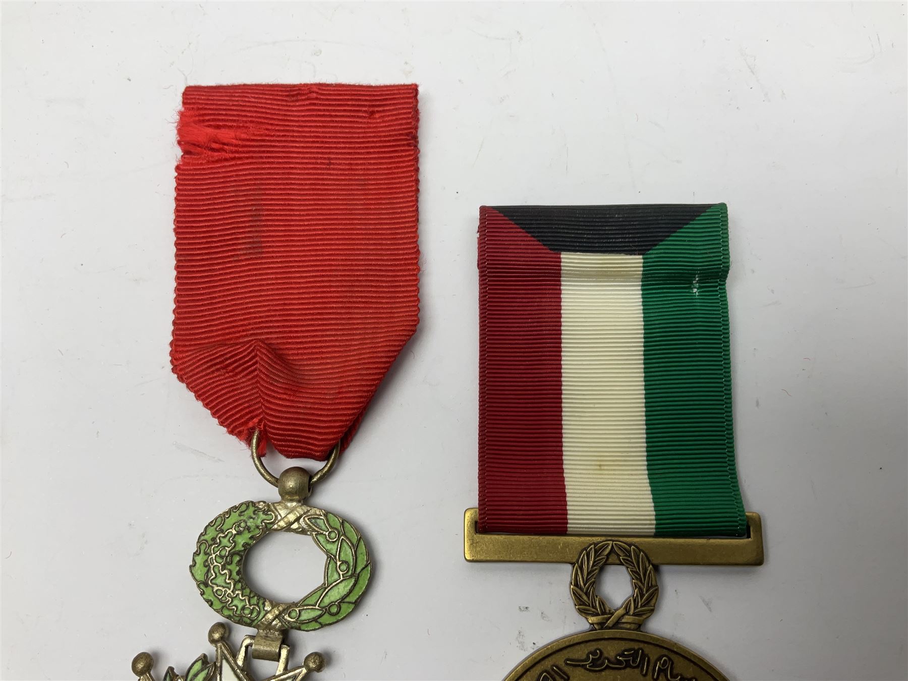 RAOB jewel Bourn Lodge 9394 with 25 years bar; two masonic jewels and triangular pendant watch; British Iron Cross style propaganda medallion; French Legion of Honour and Combatants Cross; and three foreign medals