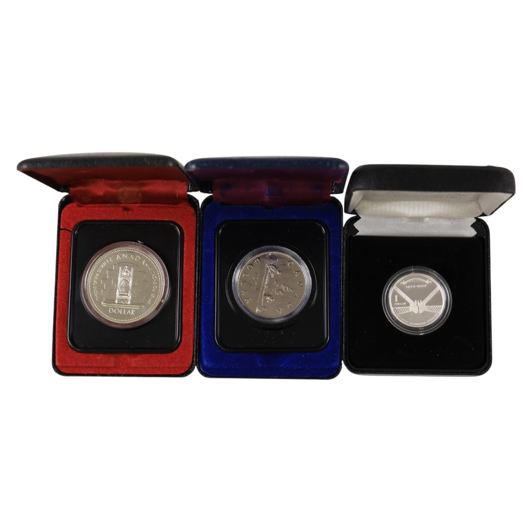 Nine world silver coins or sets, including The Royal Mint United Kingdom 1977 silver proof fifty pence two coin set, 1977 'Silver Jubilee' silver proof crown, USA 2014 'National Baseball Hall of Fame' silver dollar, Australia 2007 '75th Anniversary of the Sydney Harbour Bridge' one dollar fine silver coin, etc, together with a Canada 1975 one dollar, mostly cased with certificates